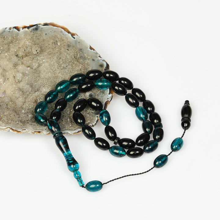 Turkuaz Rengi-Siyah Sıkma Kehribar Tesbih (7×11 mm)