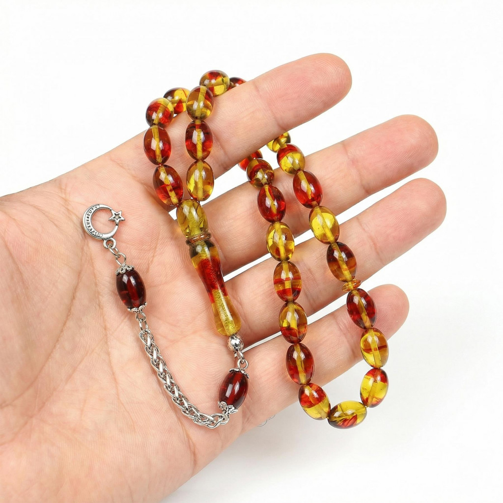 Bakır Ateş – Altın Hareli Çelik Püsküllü Sıkma Kehribar Tesbih (7*11 mm)