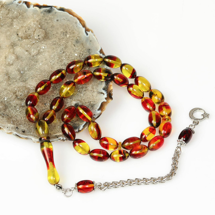 Bakır Ateş – Altın Hareli Çelik Püsküllü Sıkma Kehribar Tesbih (7*11 mm)