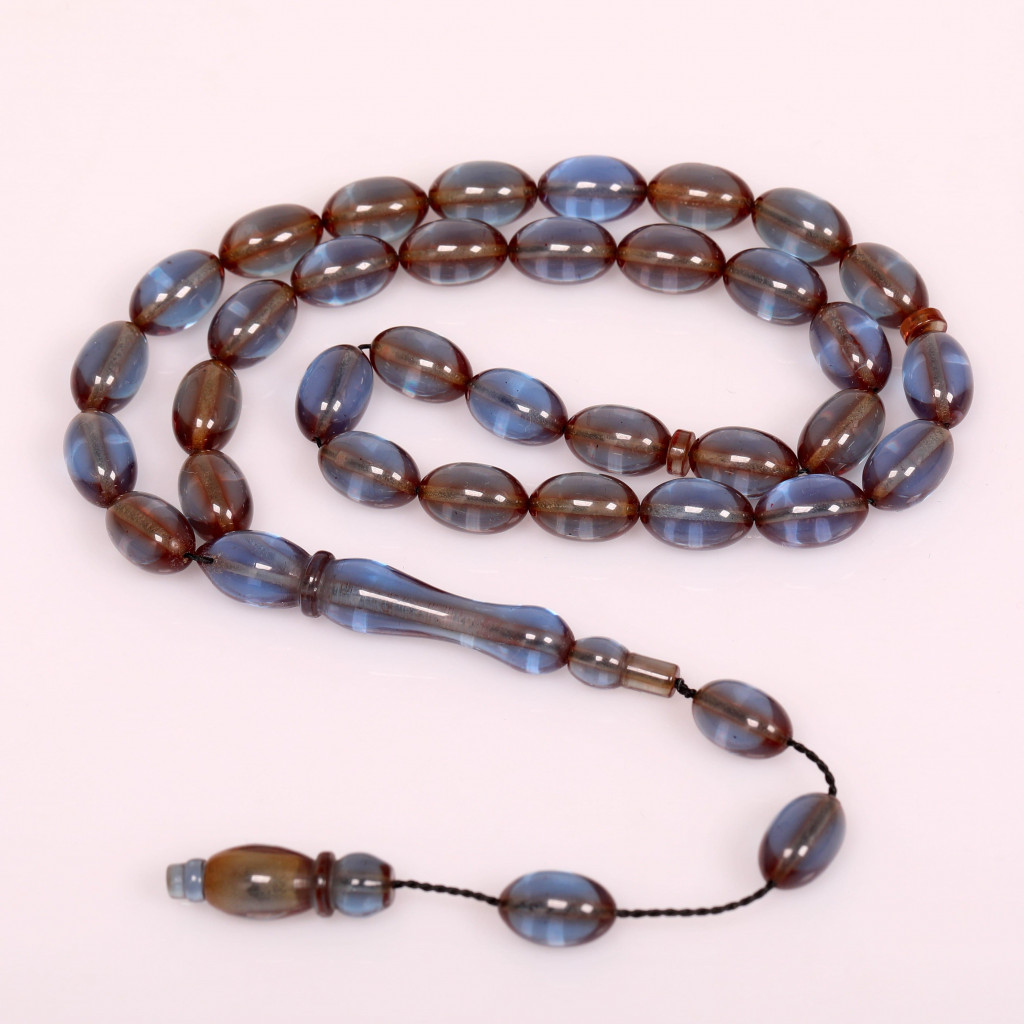 Dumanlı Mavi Renk Sıkma Kehribar Tesbih 7*11 mm Dumanlı Mavi Renk Sıkma Kehribar Tesbih 7*11 mm