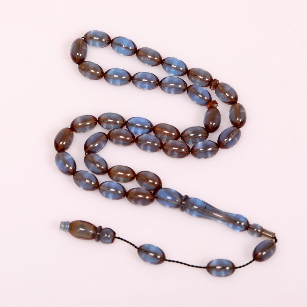 Dumanlı Mavi Renk Sıkma Kehribar Tesbih 7*11 mm Dumanlı Mavi Renk Sıkma Kehribar Tesbih 7*11 mm