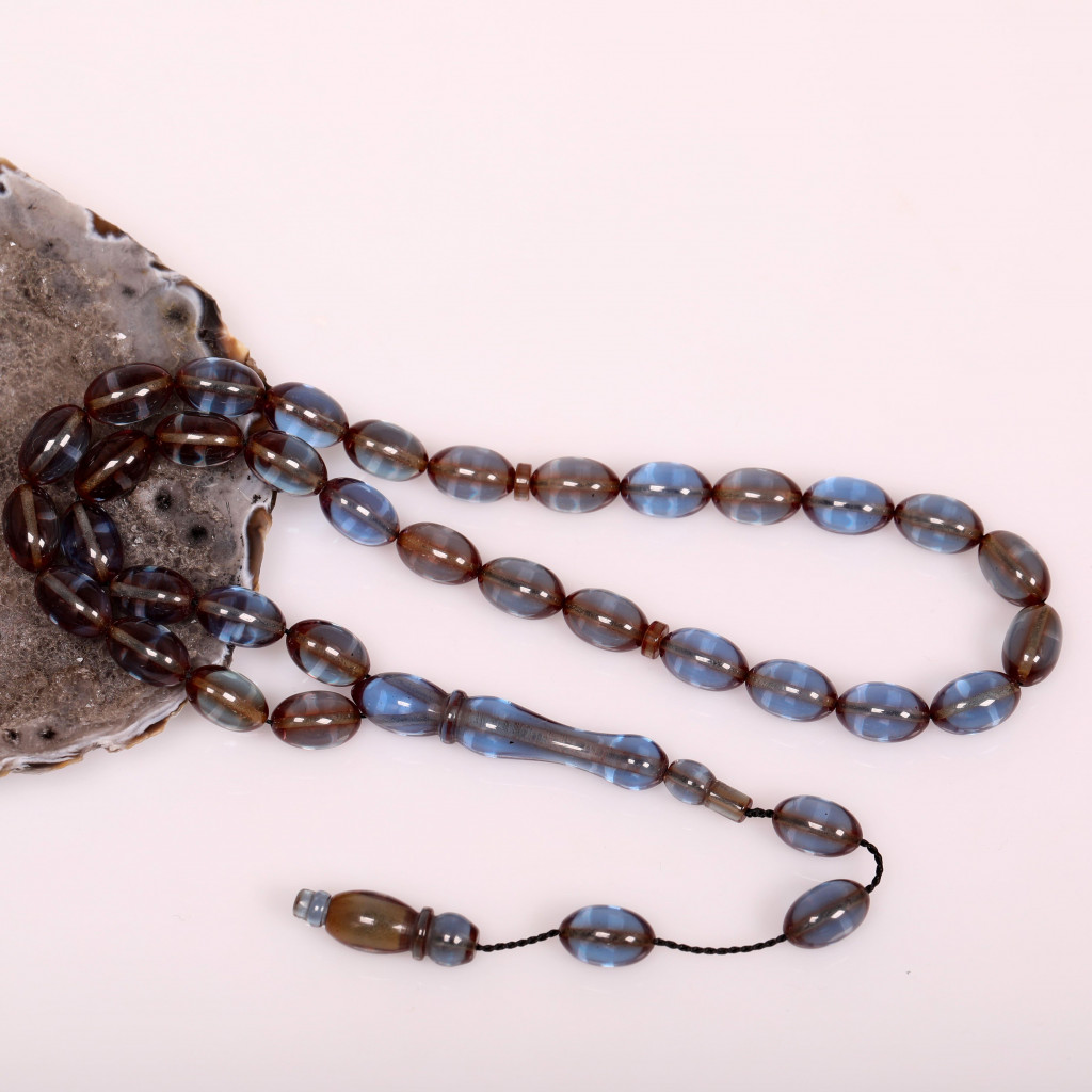 Dumanlı Mavi Renk Sıkma Kehribar Tesbih 7*11 mm Dumanlı Mavi Renk Sıkma Kehribar Tesbih 7*11 mm