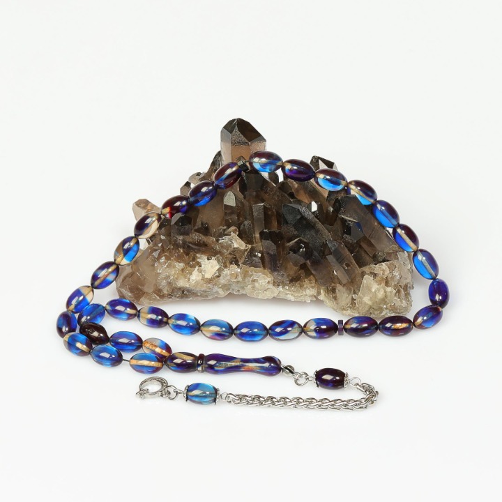 Gece Seması Çelik Püsküllü Sıkma Kehribar Tesbih (7*11 mm)