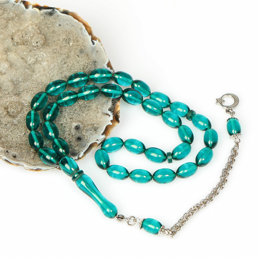 Turkuaz Esintili Çelik Püsküllü Sıkma Kehribar Tesbih (7*11 mm)