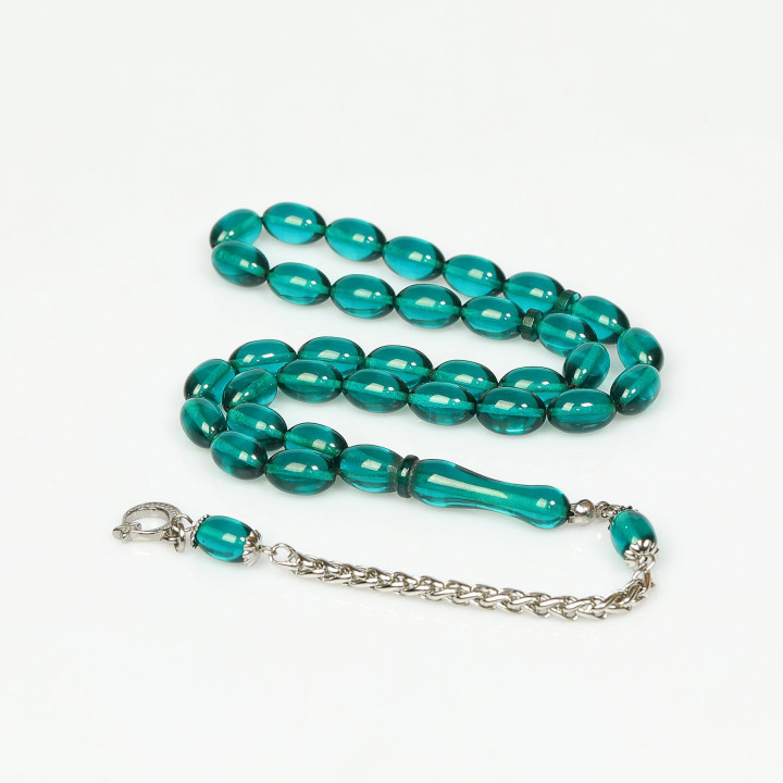 Turkuaz Esintili Çelik Püsküllü Sıkma Kehribar Tesbih (7*11 mm)